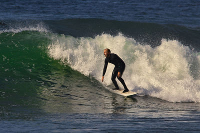 Man surfing in sea