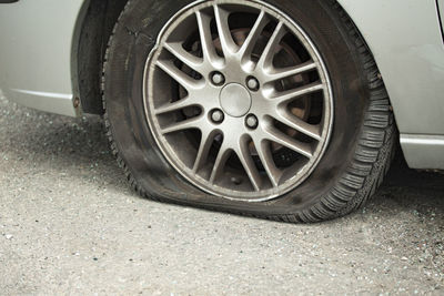 Close-up of vintage car on road