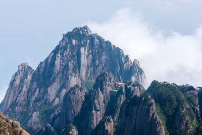 Panoramic view of rocky mountains against sky