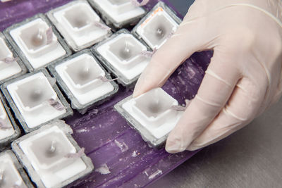 Scientist preparing paraffin blocks containing biopsy tissue for sectioning. pathology laboratory. 