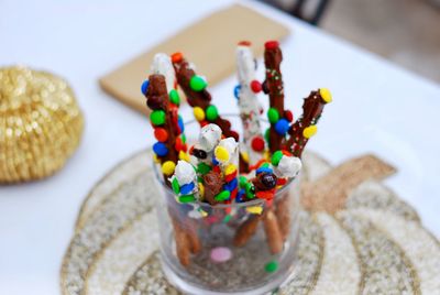 Close-up of multi colored candies on table