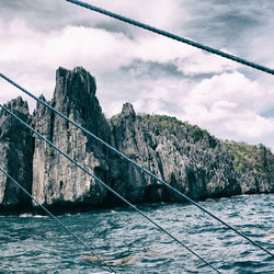 Bridge over sea against sky