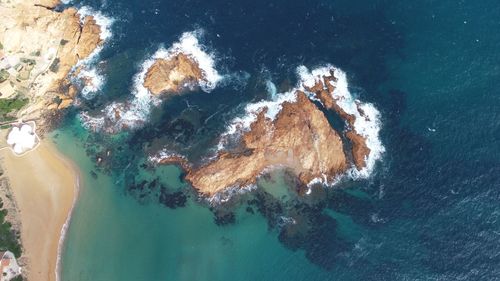 High angle view of rocks on beach