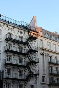 Low angle view of building against clear blue sky