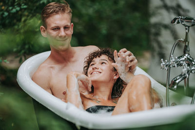 Portrait of a smiling young couple