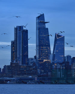 View of city buildings at dusk