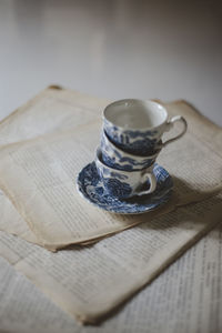 Close-up of tea cups on table