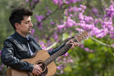 Young man playing guitar