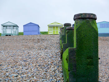 Lifeguard hut on beach against clear sky