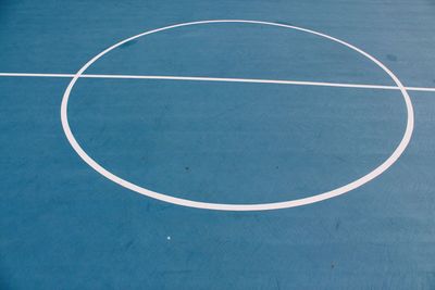 High angle view of basketball hoop against blue sky