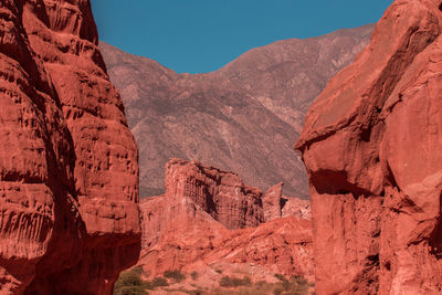 View of rocky mountains against sky