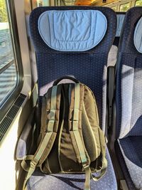 Bag on seat in bus