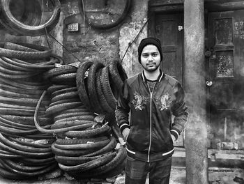 Portrait of young man standing outdoors