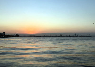 View of calm sea at sunset