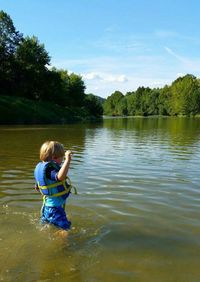 Woman looking at lake