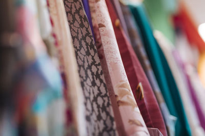 Close-up of multi colored clothes for sale