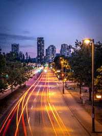 Light trails on city street at night