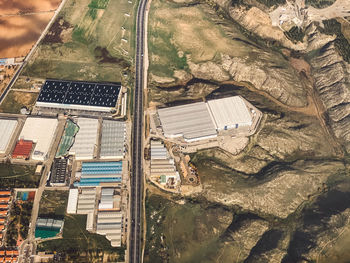 High angle view of road amidst buildings in city