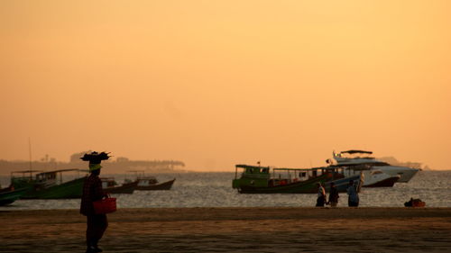 Scenic view of sea at sunset