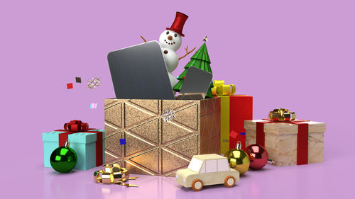 Electric lamp in box against colored background