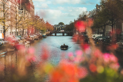 View of bridge over canal in city