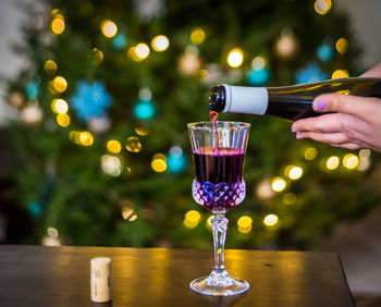 Close-up of wine glasses on table