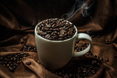 Close-up of coffee cup on table