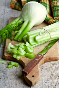 High angle view of vegetables on cutting board