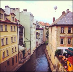 View of canal in city