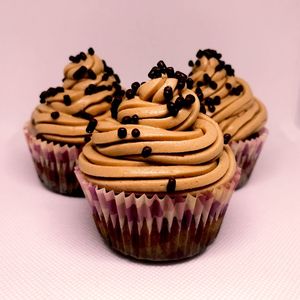 Close-up of cupcakes against white background