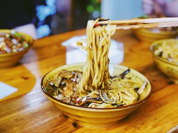 Close-up of noodles served in bowl on table