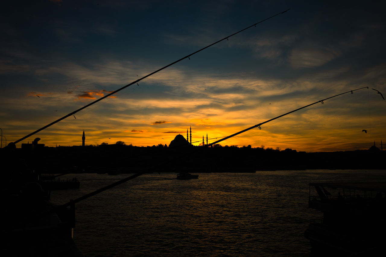 SILHOUETTE BRIDGE AGAINST SKY AT SUNSET