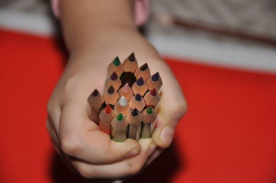 Close-up of baby holding hand