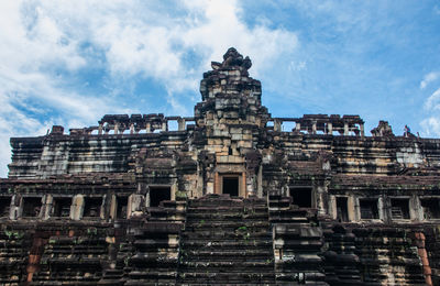 Low angle view of old building against sky