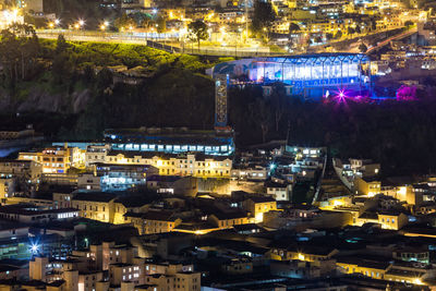 High angle view of illuminated buildings at night