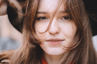 Close-up portrait of smiling woman