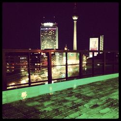 Low angle view of modern building at night