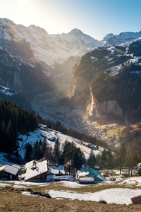 Scenic view of snowcapped mountains against sky