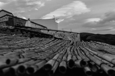 Close-up of wood against sky