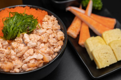 High angle view of chopped vegetables in bowl on table