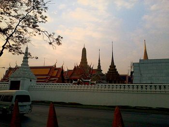 View of buildings against cloudy sky