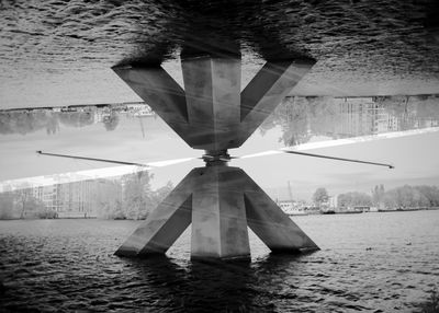 Reflection of building on puddle