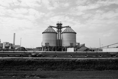 Low angle view of factory against sky