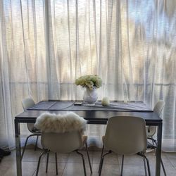 Potted plants on table at home
