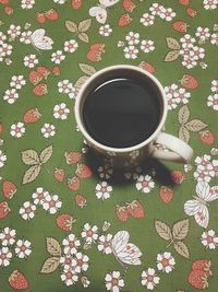 Close-up of coffee cup on table