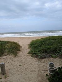 Scenic view of beach against sky