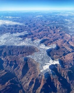 Aerial view of landscape with mountain in background