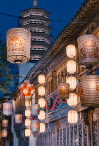 Low angle view of illuminated chandelier