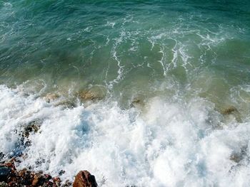 Waves splashing on rocks