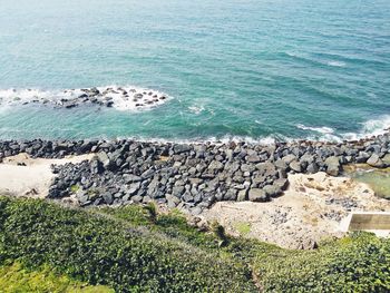 High angle view of rocks on beach